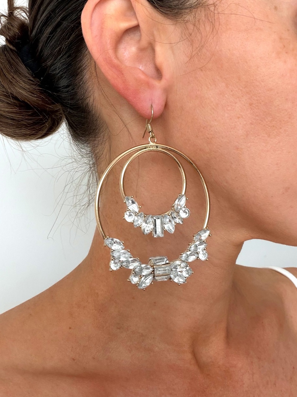 Large gold tone statement double hoop earrings w/ clear crystal embellishments